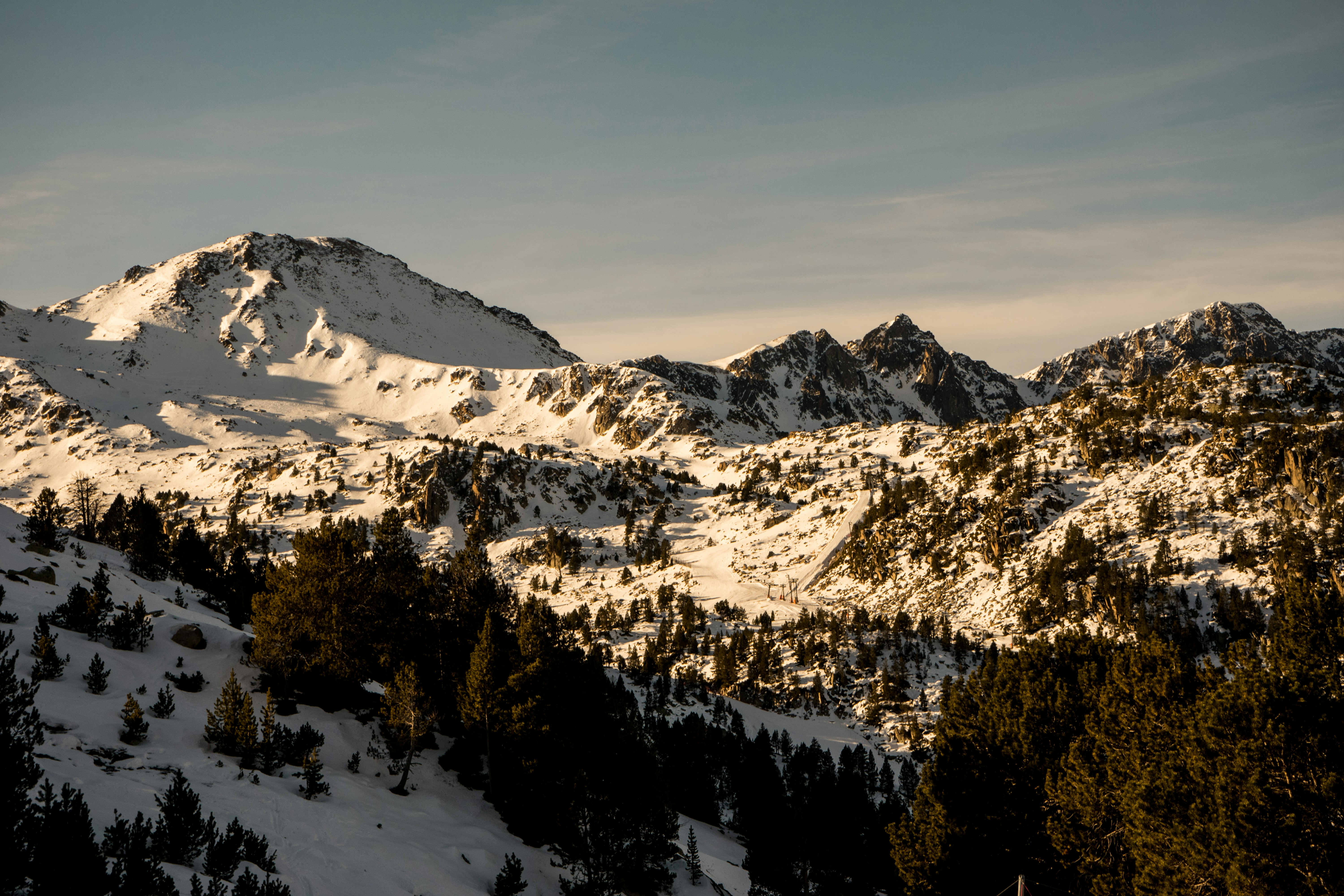 mountain covered by snow during daytime